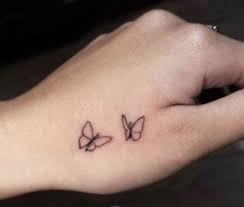 Pin By Quinn On Well Maybe I Feel Stabby Simple Butterfly Tattoo Simple Hand Tattoos Hand Tattoos For Girls