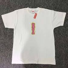 The brand produces clothes and accessories and also manufactures skateboards. Hot Supreme Japanese Character White Tee And New T Shirts Online For Sale