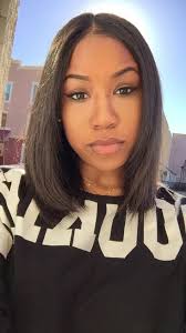 With high and lowlights, her color pops, complimenting her skin tone. 120 Flat Iron Success Ideas Natural Hair Styles Hair Styles Curly Hair Styles