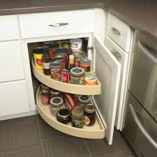 From the outside, it looks like any other cabinet in your kitchen, but rather than just swinging open, it pulls out and unfolds to give you easy access to anything you're storing in it. Lazy Susan Cabinet Dimensions Belezaa Decorations From Lazy Susan Cabinet In Great Ideas Pictures