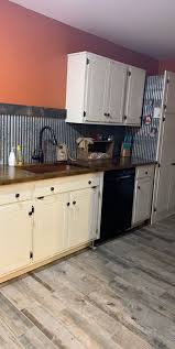 Expatica is the international community's online home away from home. Corrugated Metal Backsplash With White Cabinets In 2021 Kitchen Design Decor Metal Backsplash Kitchen Kitchen Design