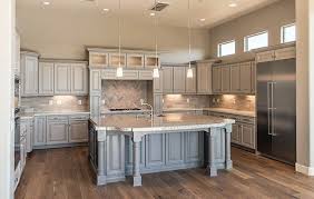 Traditional Kitchen With Off White Cabinets And Gray Island Budget Kitchen Remodel Grey Kitchen Cabinets White Kitchen Remodeling