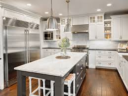 Apply the paint start by painting the inside edges and openings of the face frames, then the outer cabinet sides, and finally the face frame fronts. Kitchen Remodeling Planning Cost Ideas This Old House