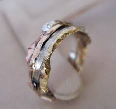 This Ring Captures The Beauty Of Gold And Silver Metals In A Design That Evokes Immediacy Unconventional Wedding Rings Viking Wedding Ring Wedding Rings Unique