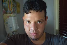 This is a photo of myself and my late brother, could someone please make it  come alive Thank you in advance