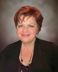 Mrs. Natalie Béland