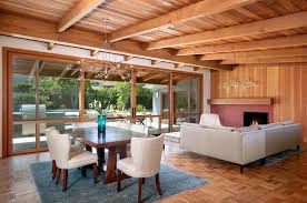 The low slung roof lines of this 1963 modern post and beam home tucked under and around massive old trees was restored, expanded and modified in 2017! Absolutely Stunning Renovation Of A Mid Century Modern Home In La