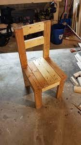 i made a 2x4 chair from online instructions it ain t much but it s a start woodworking wood chair diy wood pallet crafts diy outdoor furniture