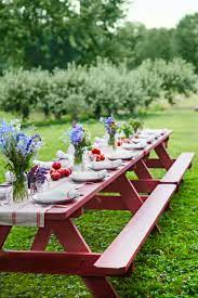 These affordable table decorations offer an easy way to give your table setting an instant lift. 57 Fresh Centerpieces And Decorations To Spruce Up Your Table For Spring Picnic Table Centerpieces Easter Table Decorations Picnic Table Decor