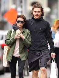  Emma Roberts And Evan Peters Twin With Matching Topknots Vogue
