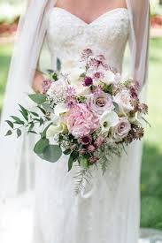 Our elegant bouquet in shades of blush pink and creamy white brings all the charm of a rustic country garden to the people you care about. Wedding Flowers Wedding Florist Wedding Bouquet Central Illinois Wedding Fancy Florals By Nancy