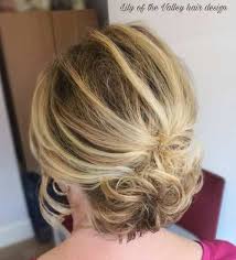 After pulling hair into the updo of your choice, blow dry your bangs so they sit flat against your forehead, then separate them out with a tiny bit of pomade like the. 50 Ravishing Mother Of The Bride Hairstyles