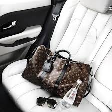 Louis Vuitton Black Logo Travel Duffel Bag Louisvuittonhandbags Louis Vuitton Louis Vuitton Handbags Minimalist Bag
