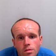 Thugs wielded weapons when protecting woman