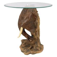 Find a variety of elephant tables available on 1stdibs. Lord Earl Houghton S Trophy Elephant Glass Topped Table In 2021 Elephant Home Decor Elephant Table Elephant