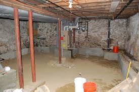 A toilet is moved with its plumbing in the concrete basement floor. Renovating A 100 Year Old Basement Raam Dev