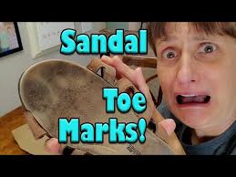 The filthy toe marks ruined my sandals