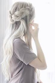 A tattoo in the form of a feather. Half Up Dutch Crown Braid Hairstyle Alex Gaboury