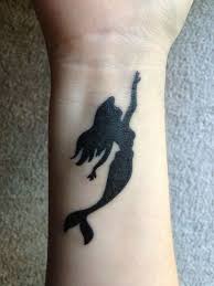 These small tattoos, as seen on celebrities, make the perfect accessory. Lovely Mermaid Tattoos Cuded Mermaid Tattoo Designs Mermaid Tattoo Little Mermaid Tattoo