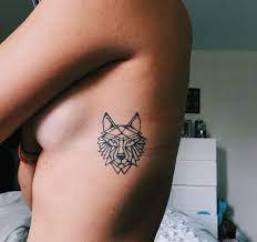 70 Majestic Wolf Tattoos For True Free Spirits Geometric Wolf Tattoo Wolf Tattoos For Women Simple Wolf Tattoo