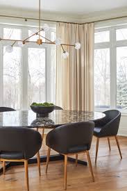 Even though rooms are separate, large doorways, high ceilings, and windows still allow these homes to feel. Large House Design Transitional Dining Room Toronto By Elisse Navi Interiors Houzz