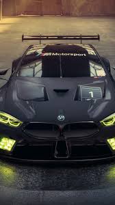 2018 Bmw M8 Gte Black Racing Car Headlight 750x1334 Iphone 8 7 6 6s Wallpaper Background Picture Image