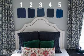 Painting your walls in navy is very on trend for 2018, we love feature walls in navy, navy paint color schemes for master bedrooms, living rooms, accent walls, front doors and more! Best Navy Blue Paint Colors