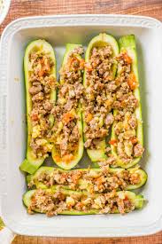 Heat oven, prepare baking dish: Healthy And Easy Baked Stuffed Zucchini Baked Stuffed Zucchini