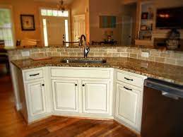 Molded door panel for kitchen cabinet is made off hdf/mdf and melamine paper veneer, which credits its fresh appearance. Merillat Seneca Ridge Cabinets With Chiffon Paint And Desert Glaze Oil Rubbed Bronze Handles And Granite Tops Installing Cabinets Cabinet Design New Homes