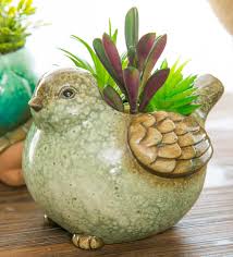 Check spelling or type a new query. Ceramic Bird Planter With Faux Succulents Wind And Weather