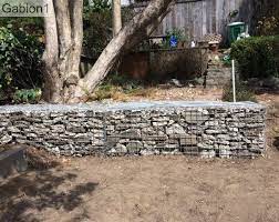 San Francisco Gabion Filled With Recycled Concrete It Actually Turned Out Real Great Better Than I Tho Recycled Concrete Broken Concrete Backyard Landscaping