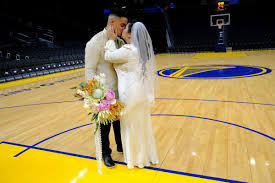 Maybe you would like to learn more about one of these? These Warriors Superfans Just Got Married At Chase Center