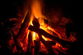 Starting a fire in a fire pit. How To Build 5 Different Types Of Campfire