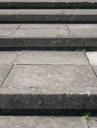 How To Install Laminate Flooring Over Concrete Slab Hunker Concrete Porch Concrete Patio Makeover Concrete Slab