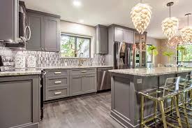 Kitchen Cabinets Professionally Painted Dark Gray With Golden Metal Hardware In 2020 Cost Of Kitchen Cabinets Building Kitchen Cabinets Custom Kitchen Cabinets