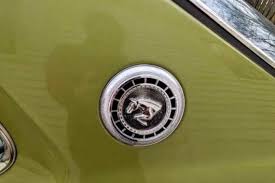 Image result for Bright Yellow 1976 Colt