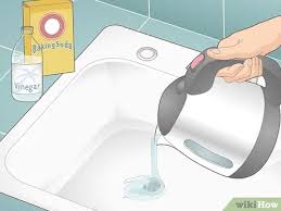 Empty a box of baking soda into your drain, then pour in some apple cider vinegar. 4 Ways To Clean Drains Wikihow