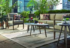 The Canvas Jensen Patio Furniture Collection Adds Dimension Functionality Style And Comfort To Your Backyard En Outdoor Furniture Sets Patio Patio Furniture