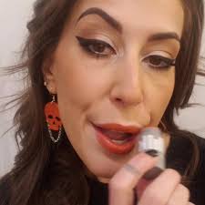 When my New Lip gloss matches my New Earrings 🧡, Happy Monday Ghouls ,  🧟‍♀️#glamourghoul, Skully Earrings: @brassmonkeyboutique  Http://www.facebook.com/brassmonkeyboutique, Lips: @milkmakeup , ...