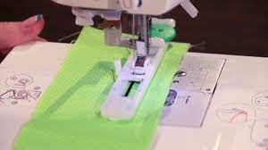 Remove your current presser foot, and then clip the buttonhole foot on. How To Use An Automatic Buttonhole Foot Youtube