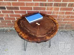 With a walnut top, solid edges, and a black steel base, let this coffee table catch the eye of any wandering guest. Custom Round Live Edge Coffee Table Claro Walnut Dark Wood Coffee Table Mid Century Tree Slice Log By Kentucky Liveedge Custommade Com