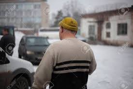 When the man in the hat first started out, his passion for providing, good cars for good people, gave him the motivation and inspiration to turn a six car lot into a car lot with over 220 cars! A Man From The Back In The Street The Guy In The Garage Is Wearing Stock Photo Picture And Royalty Free Image Image 150579698