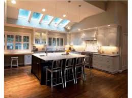 Much of the wall and ceiling space often goes unused in kitchens with vaulted ceilings. Modern Kitchen Vaulted Ceilings Youtube