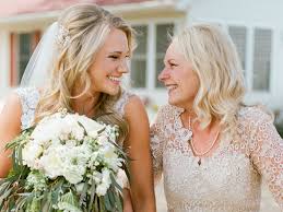Mother of the bride flowers to carry. 11 Mother Of The Bride Duties In Detail