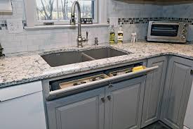 Cambria seagrove with glazzio metal and glass mosiac backsplash. Cambria Praa Sands Quartz Counters Subway Tiles With Mosaic Accent Gray Cabinets With Tipout Tray Kitchen Redo Kitchen Renovation Powder Room Remodel