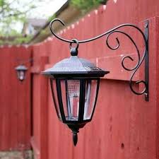 Hang Dollar Store Solar Lights On Basket Hooks Easy Backyard Diy Easy Backyard Diy Backyard