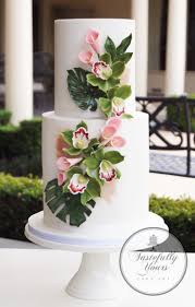 Tropical Wedding Cake With Handmade Sugar Flowers Bespoke Original Design By Tastefully Yo Gold Cake Topper Wedding Modern Wedding Cake Tropical Wedding Cake