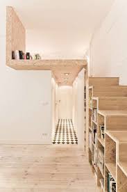 Designed By Polish Firm 3xa This Stunning Tiny Apartment Features A Loft Bed Kitchen Plenty Storage Desk An House Design Interior Architecture Architecture