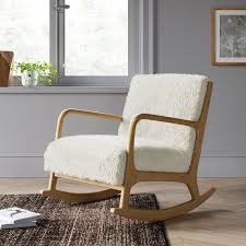 This Cozy Material Is Trending Right Now And It Makes The Warmest Blankets Wood Arm Chair Rocking Chair Nursery Rocking Chair