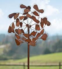 The most common wind chime garden decor material is metal. Copper Plume Wind Spinner Decorative Garden Accents Wind Spinners Garden Wind Spinners Wind Sculptures